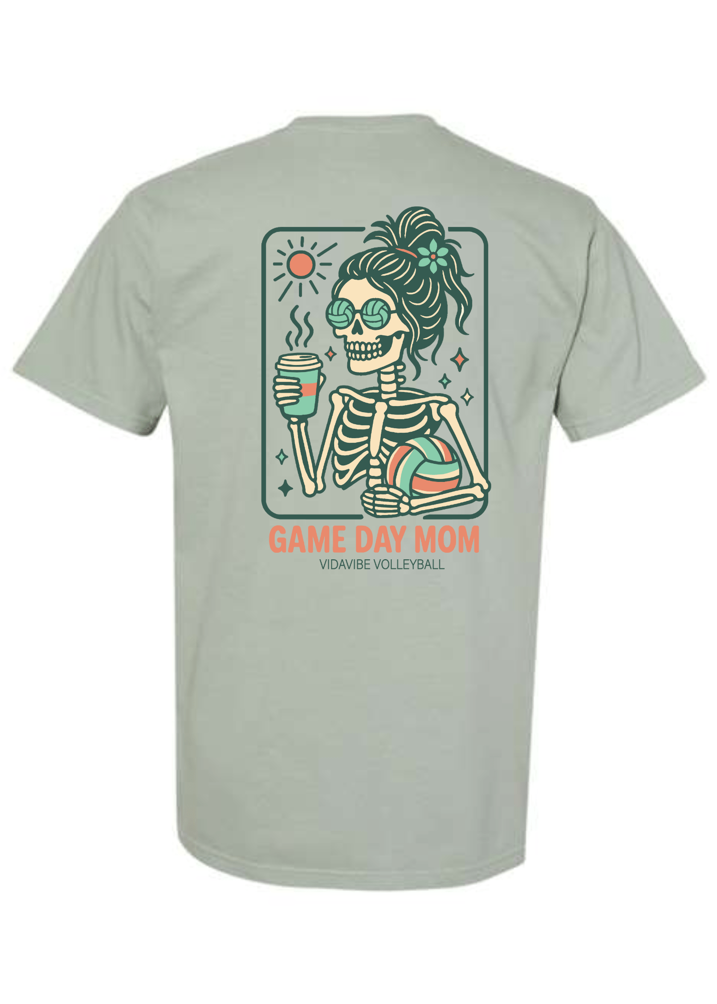 Light green t-shirt with a skeleton design and 'Game Day Mom' text on a white background