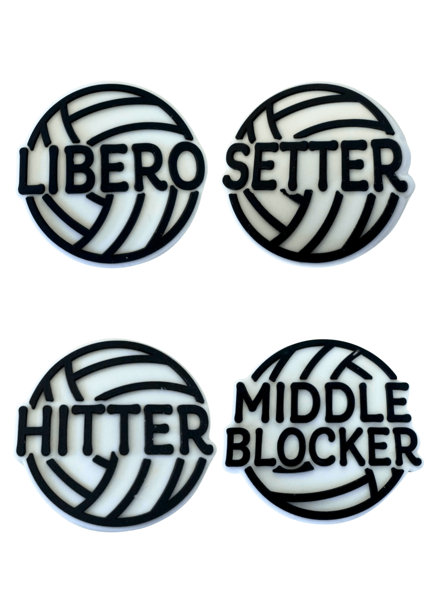 Four volleyball-themed pins with labels for libero, setter, hitter, and middle blocker on a white background.