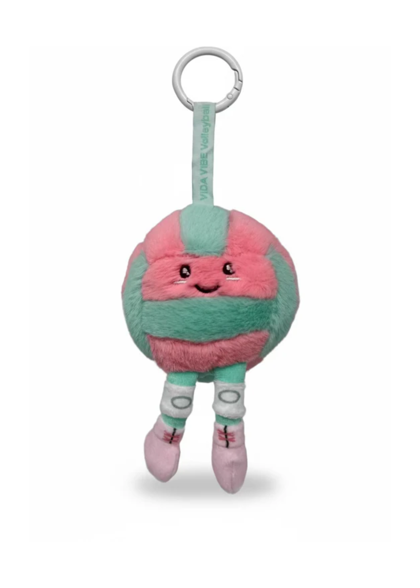 Plush toy with a smiling face, pink and green colors on a white background