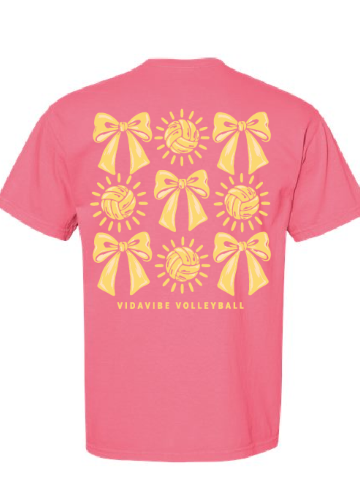 A pink short-sleeve t-shirt with a yellow graphic print on the back featuring repeating patterns of bows, volleyballs, and suns, with the text 'VIDAVIRE VOLLEYBALL' printed below.