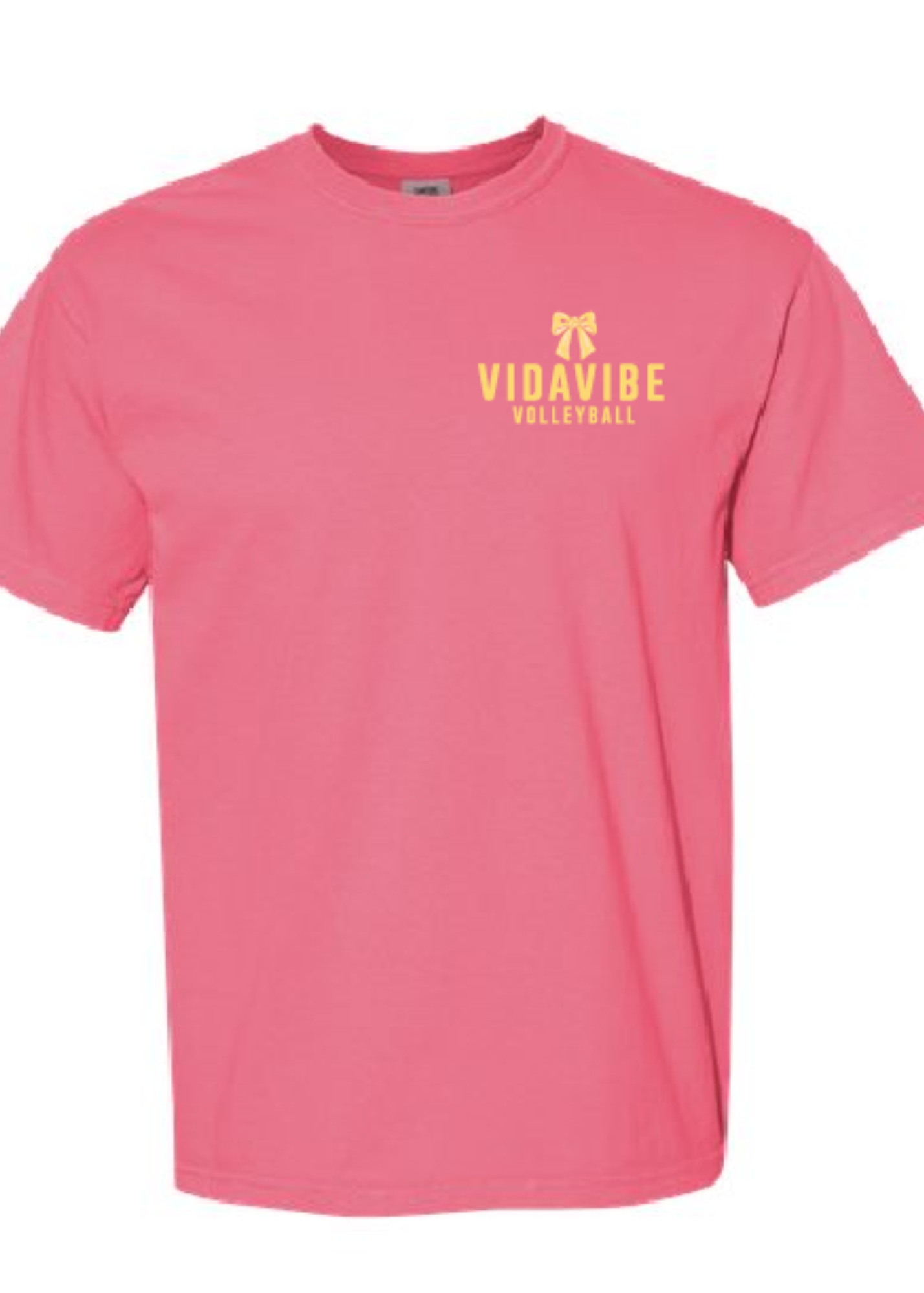 A pink short-sleeve crewneck t-shirt with a yellow 'VIDAVIBE VOLLEYBALL' graphic and bow icon on the left chest, displayed against a plain white background.