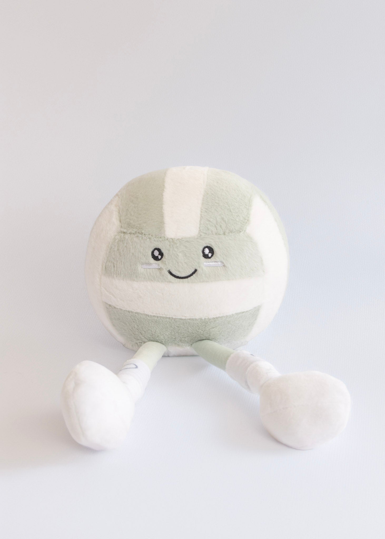 Grey & white Volleyball plushie with knee pads - gift idea for volleyball lovers everywhere